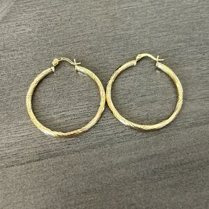 Italian 14kt Yellow Gold Twisted Hoop Earrings. 1"